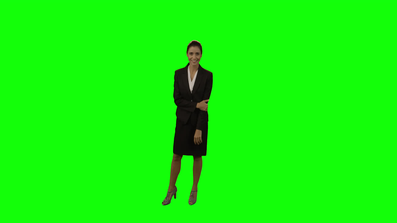 Portrait of businesswoman standing with arms crossed