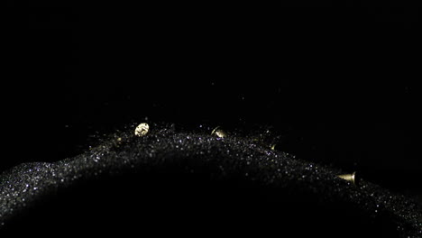 falling gun bullets on heap of gunpowder