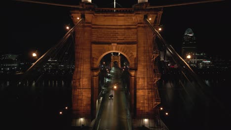 aerial suspension bridge droneto bridge tower, night, cincinnati, ohio