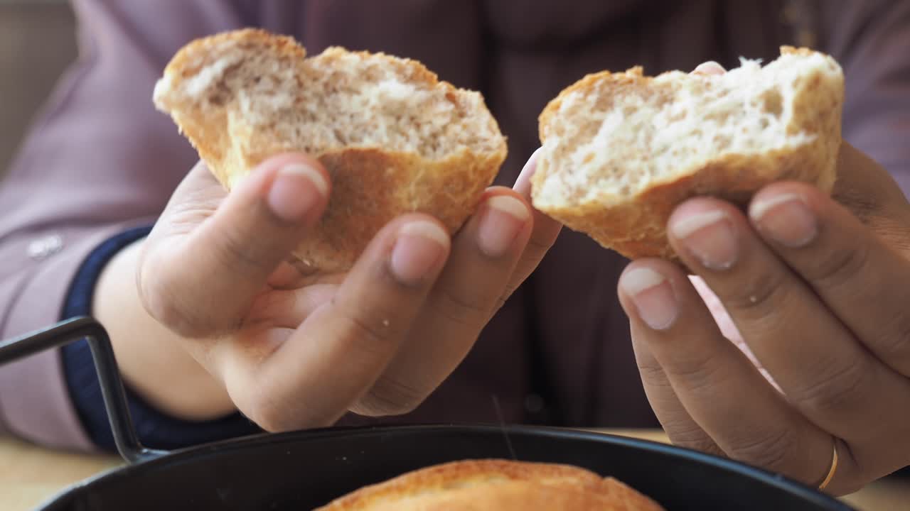 Woman Eating Bread