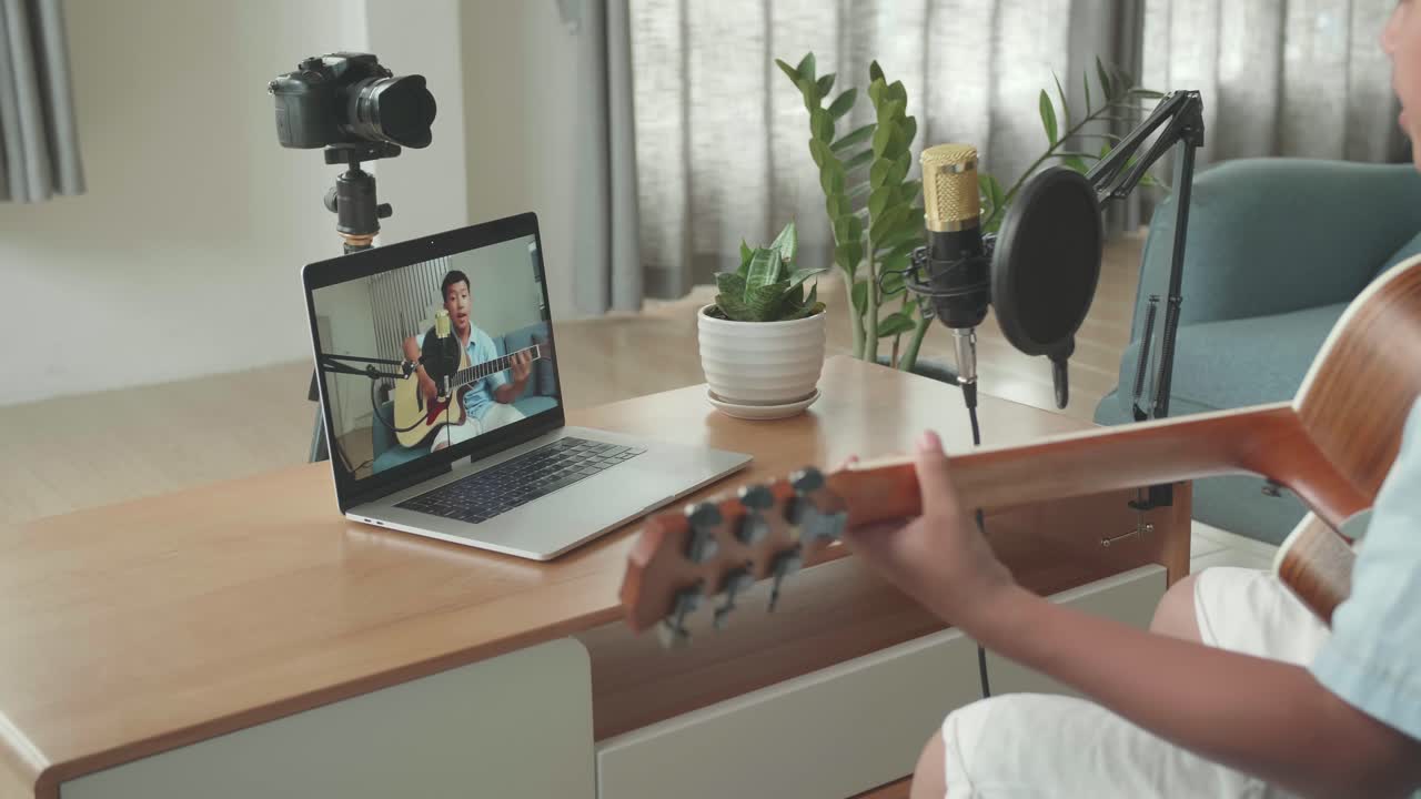 Boy Learning Guitar Online