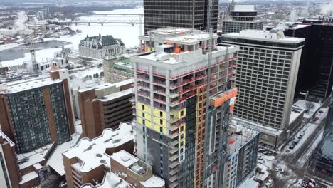 winter aerial of downtown ottawa, canada covered in snow