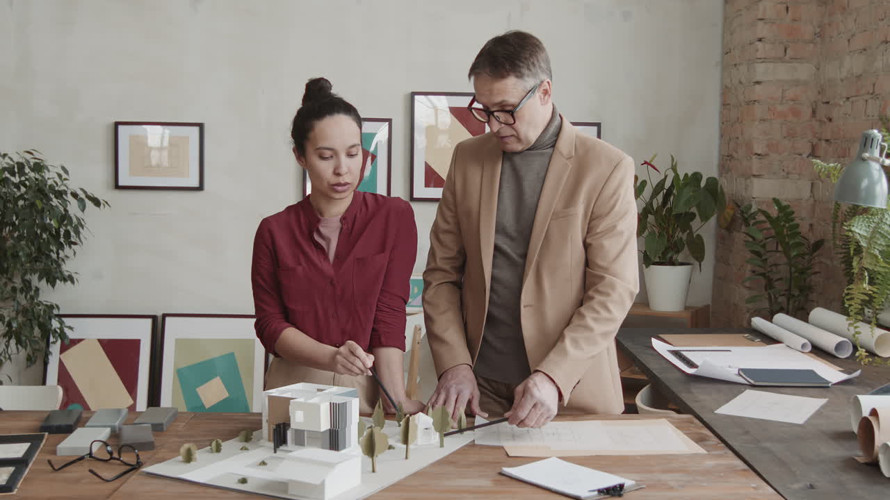 Group Of Architects Working On New House Project