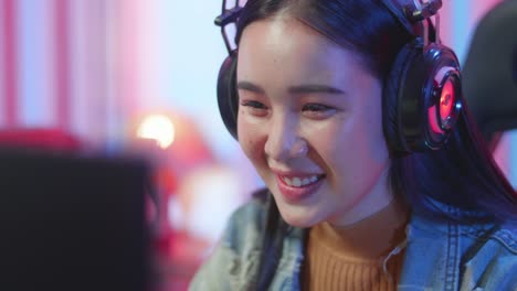 excited face girl playing video game on computer