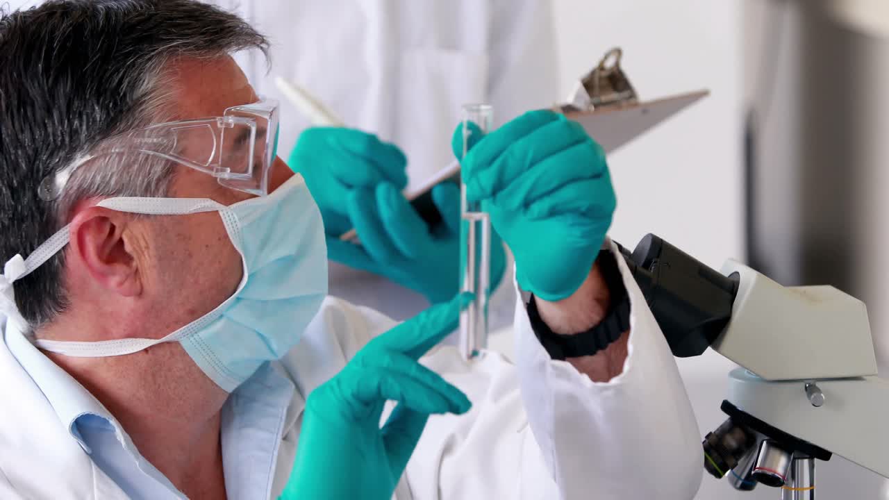 Scientists doing a chemical experiment