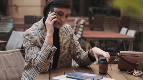 businesswoman in a coffee break outdoor.