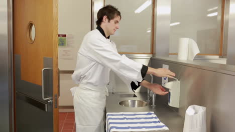 cook washing hands with soap