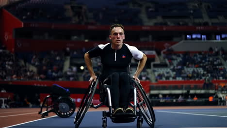 athlete in a wheelchair on a track