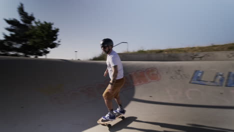 senior athlete mastering surf skateboarding in a german skate park