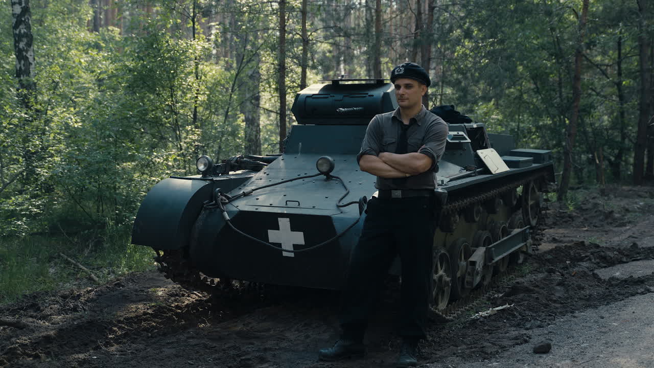 WWII Soldier by a Military Vehicle