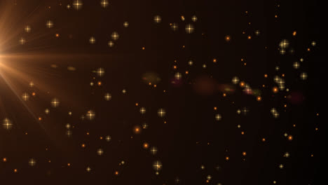 animation of golden stars falling on brown background