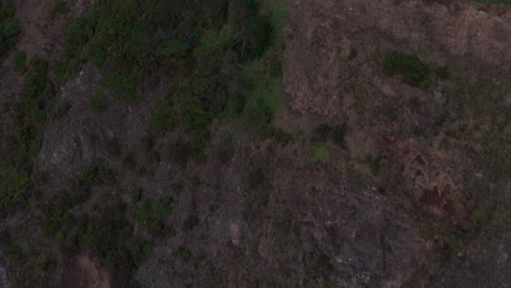 White-church-near-Fajã-Grande-with-rough-Atlantic-ocean---Drone-shot