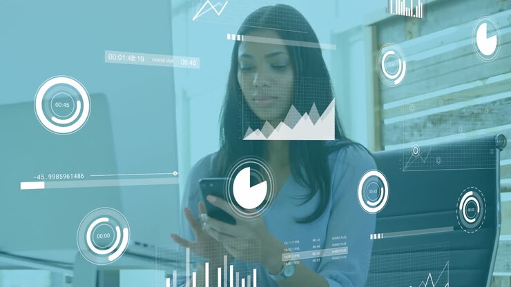 A female executive using a mobile phone in the office