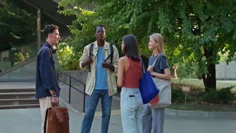 group of friends chatting outdoors