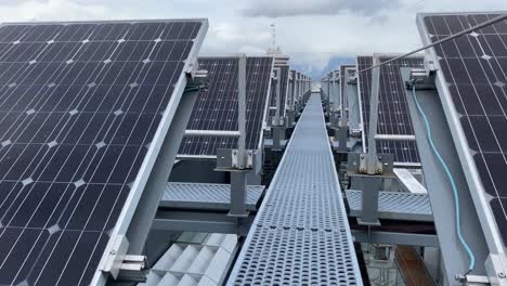 Solar-panel-station-covering-the-roof-of-Telus-garden-building-revealing-the-cityscape-of-Vancouver-downtown-Canada-during-a-cloudy-day