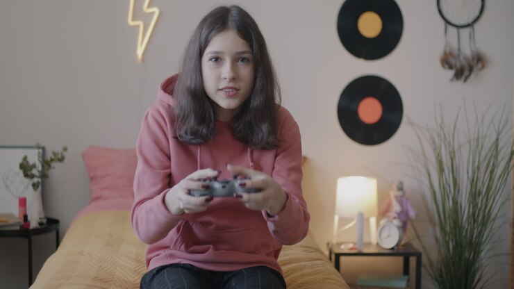 Teenager Gaming in Bedroom