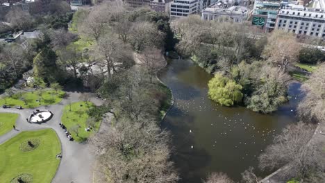 Drone-shot-of-a-city-park-in-Dublin-on-a-sunny-day-in-Spring