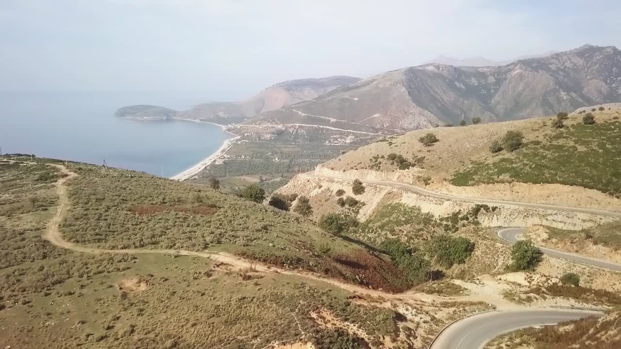 Beautiful mountain road overlooking the ocean in Europe. Borsh Drive overlooking the beach from the Adriatic sea along the Albanian Riviera