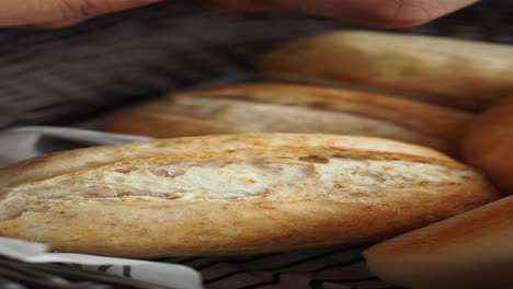 assortment of freshly baked bread in basket