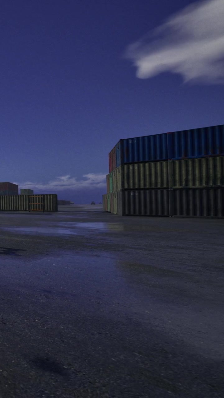Nattebillede af farverige shippingcontainere ved havet under en stjernehimmel