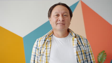 smiling asian man portrait
