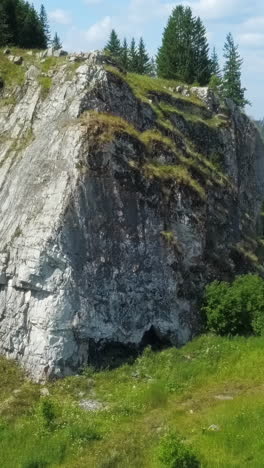 rocky mountain landscape with cave