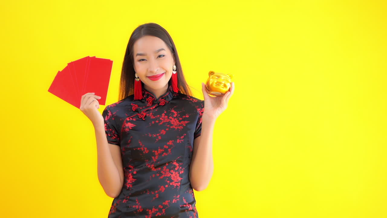 Chinese poker girl posing with raffles - lucky porcelain fortune piggy bank