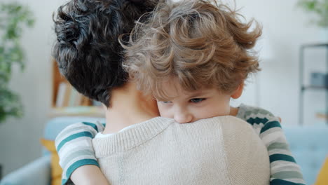 mother comforting her son