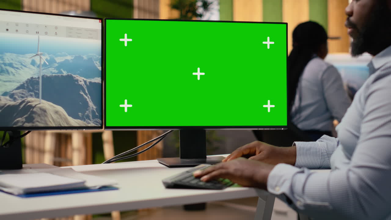 Researcher Working On Futuristic Wind Turbine On Green Screen Pc