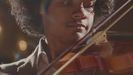 african american violinist playing fiddle
