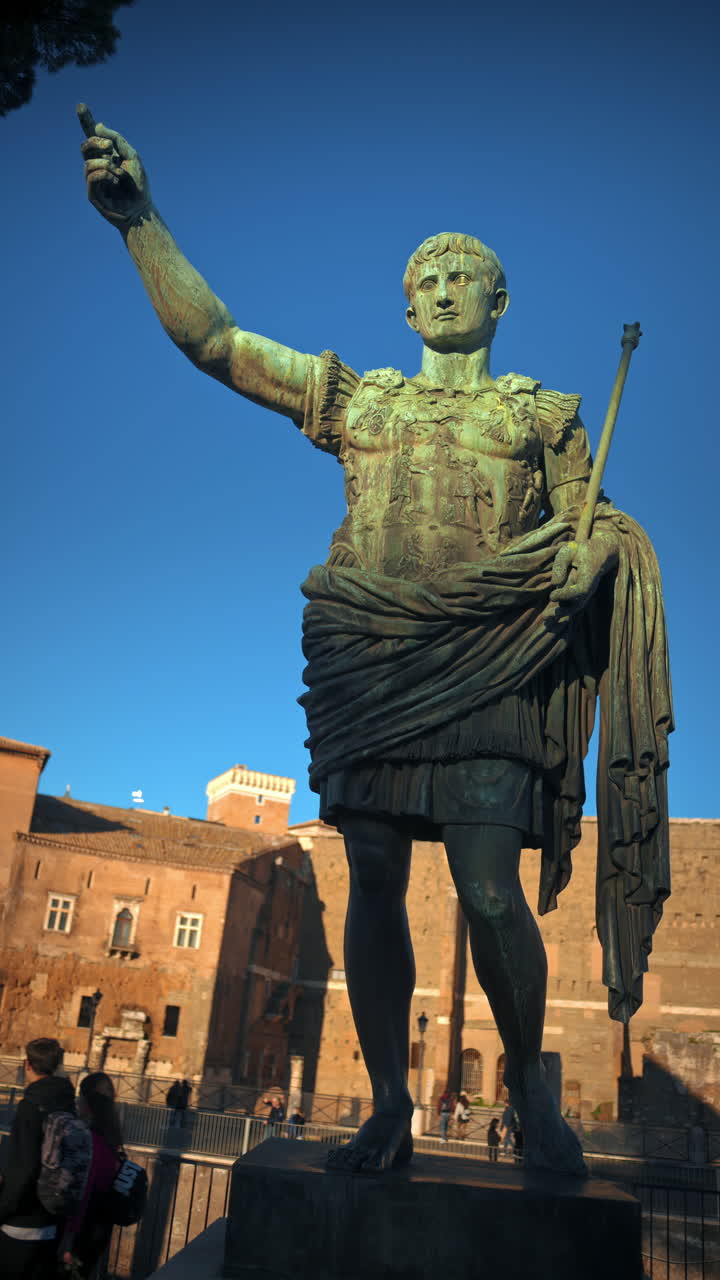 Vertical shot of Julius Caesar statue at sunset in Rome, Italy