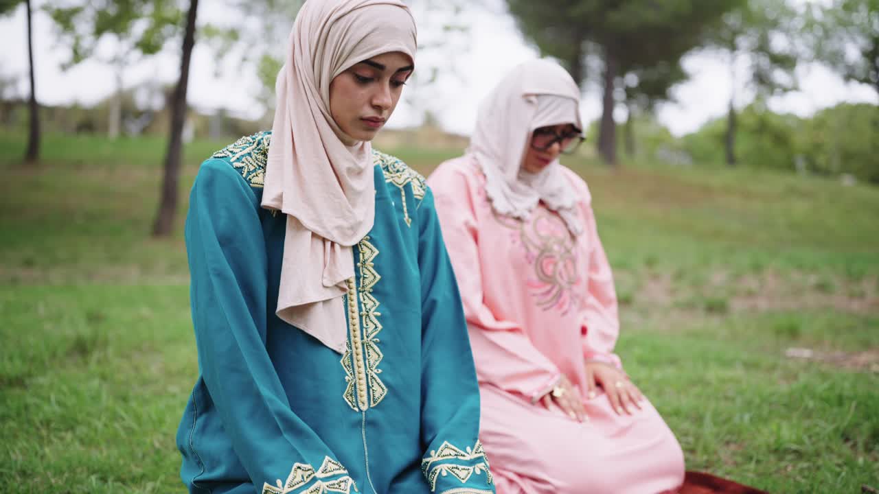 Muslim Women Praying Outdoors