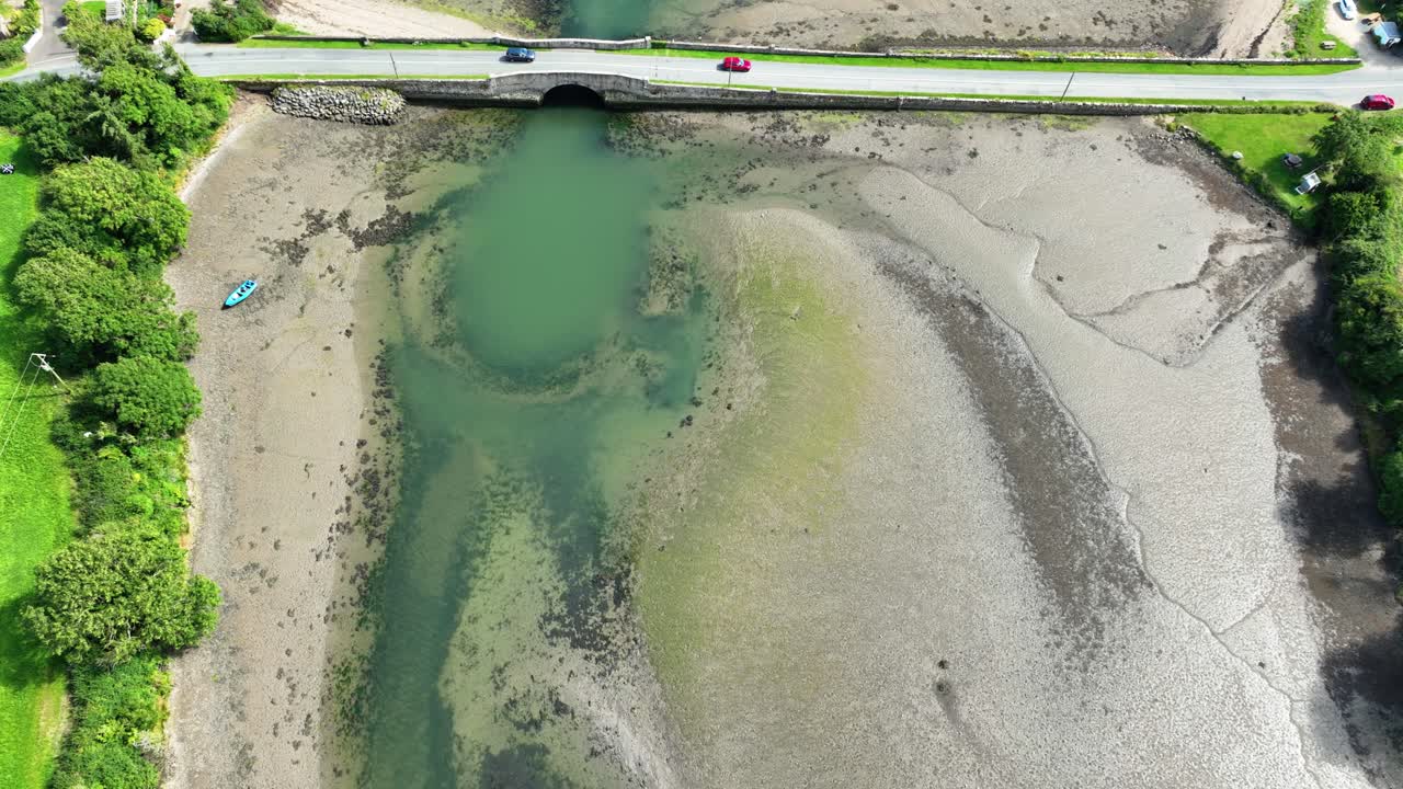 wexford epic Locations low tide at salt mills Wexford Ireland with cars on bridge on a bright summer day