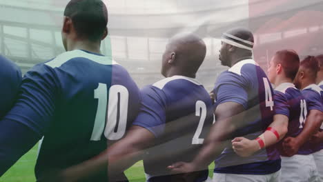 animation of flag of france over diverse male rugby players singing anthem at stadium