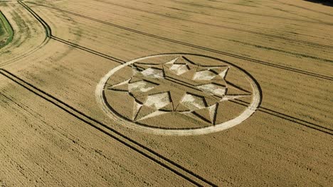 aerial view over crop circle in marten, wiltshire, uk - drone shot