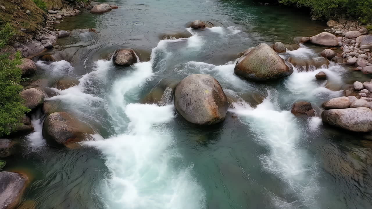 Clear Water River Flowing Over Rocks in Nature