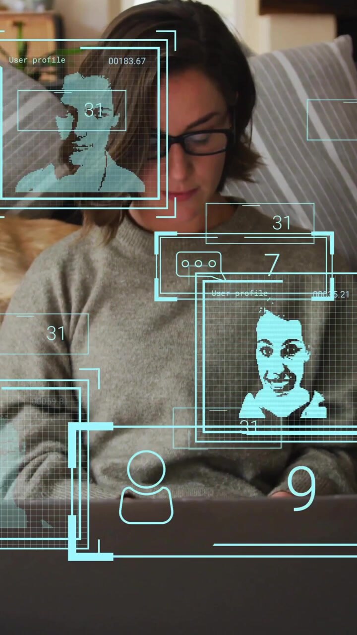 Facial recognition and data analysis animation over woman using laptop on couch