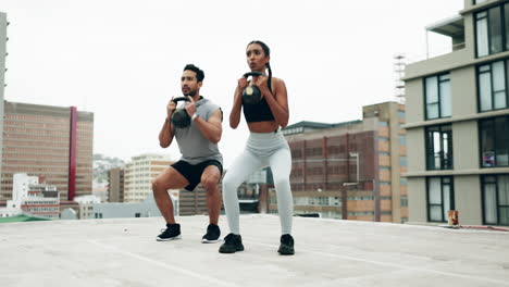 People,-personal-trainer-and-kettlebell-on-rooftop