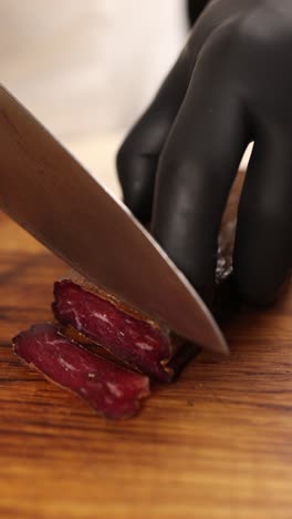 cutting dried meat