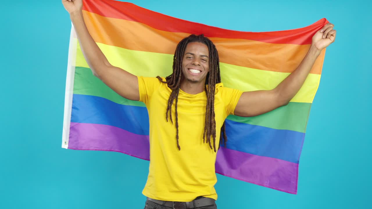 Man holding a pride flag