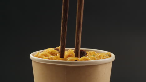 instant ramen with chopsticks