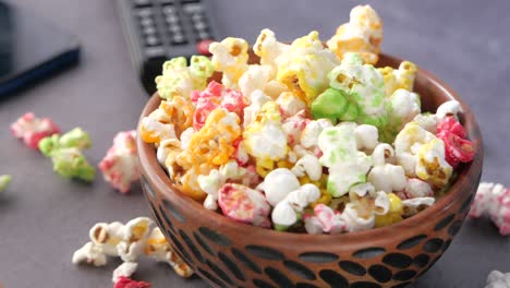 colorful popcorn and remote