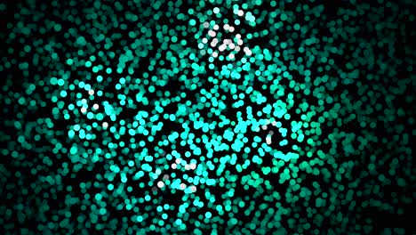 teal-bokeh-kreise auf schwarzem hintergrund