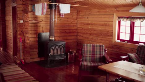 interior of mountain cabin with wood-burning stove