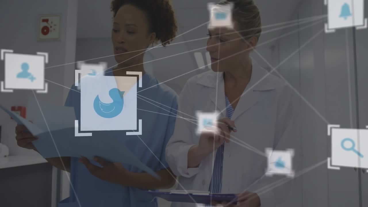 nurse and doctor reviewing patient files while walking hospital hallway, activating pulsing icons