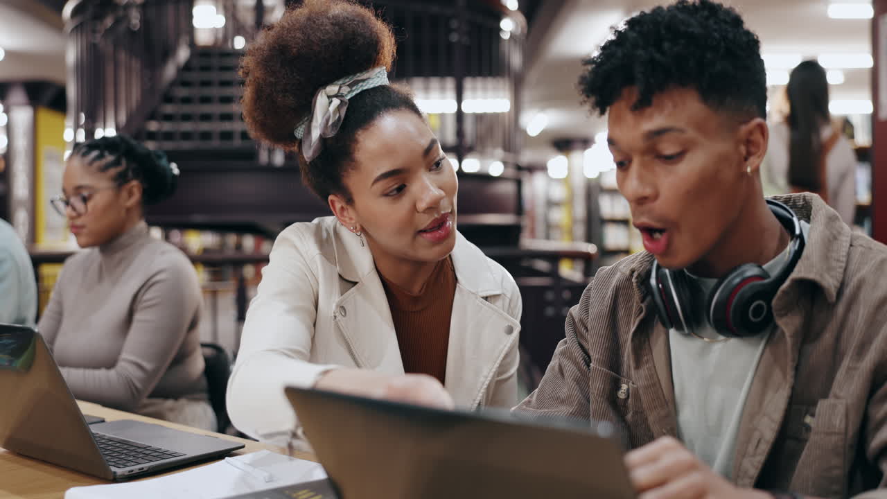 Students collaborating in a library