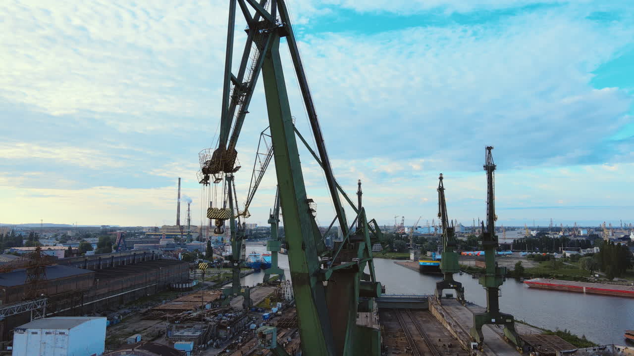Epic Aerial view of Harbour Cranes And Shipyard In Gdansk Poland