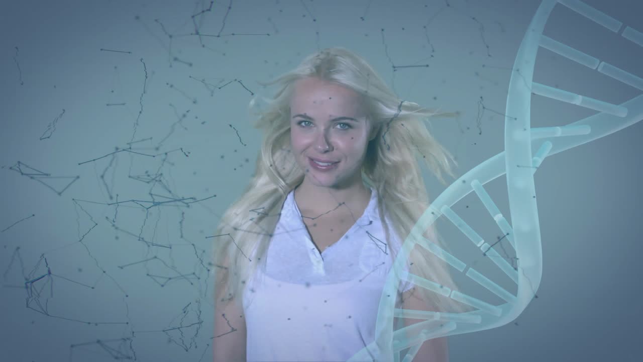 Wanita menghadap kamera, membiarkan angin mengangkat rambut saat heliks DNA dan partikel beranimasi untuk sains