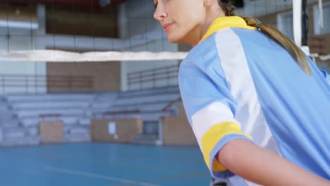 female volleyball player practising volleyball in the court 4k