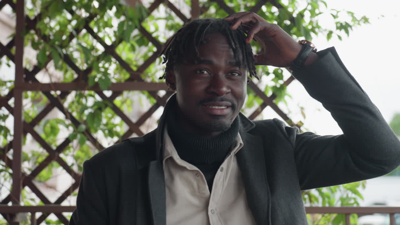 black American youth in winter jacket scans hallway left and right with urgent wide eyed look, weighing routes to beat time, quick breaths, tense shoulders, darting glances and decision making moment